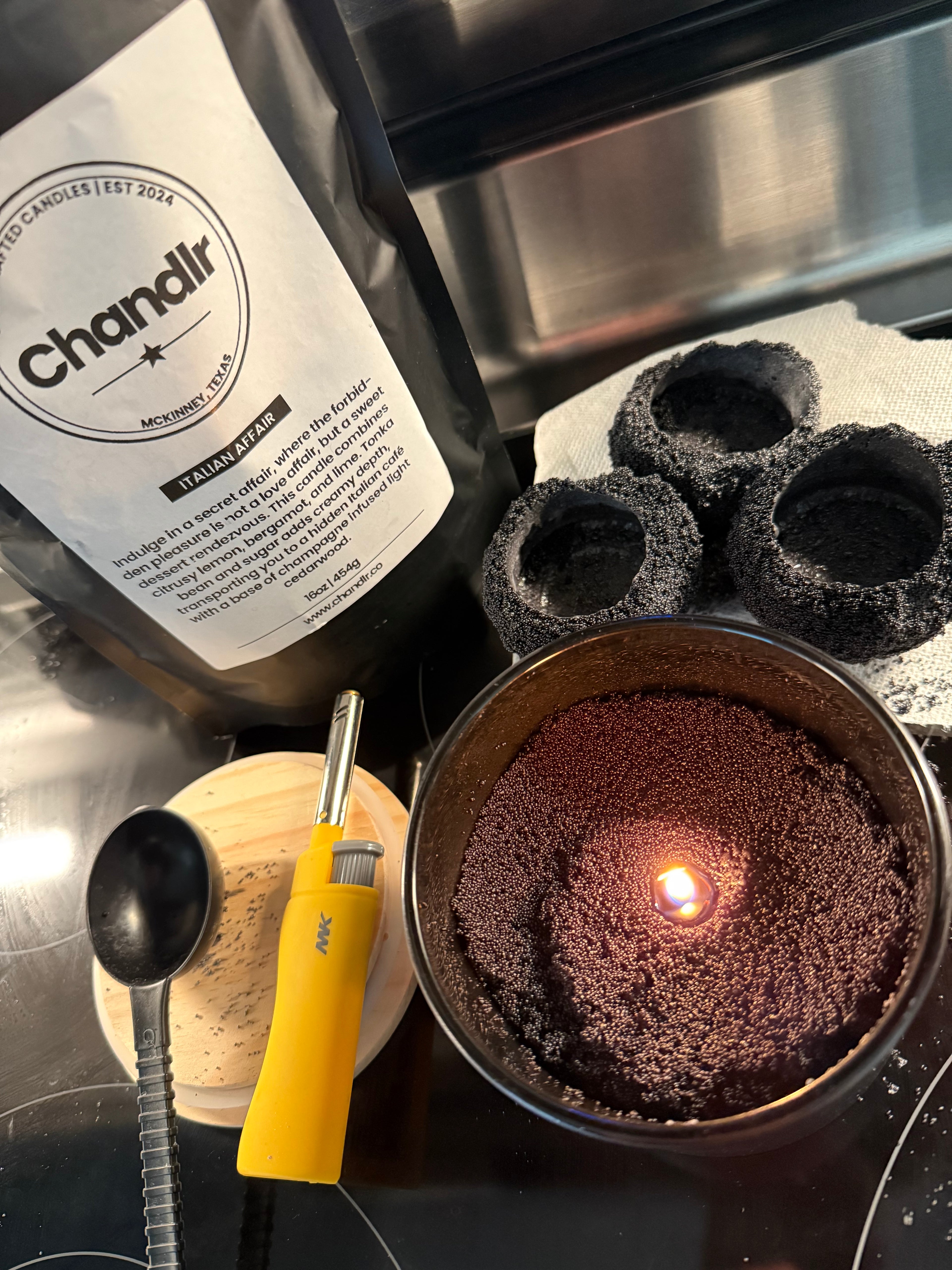 Handcrafted candle burning with warm glow